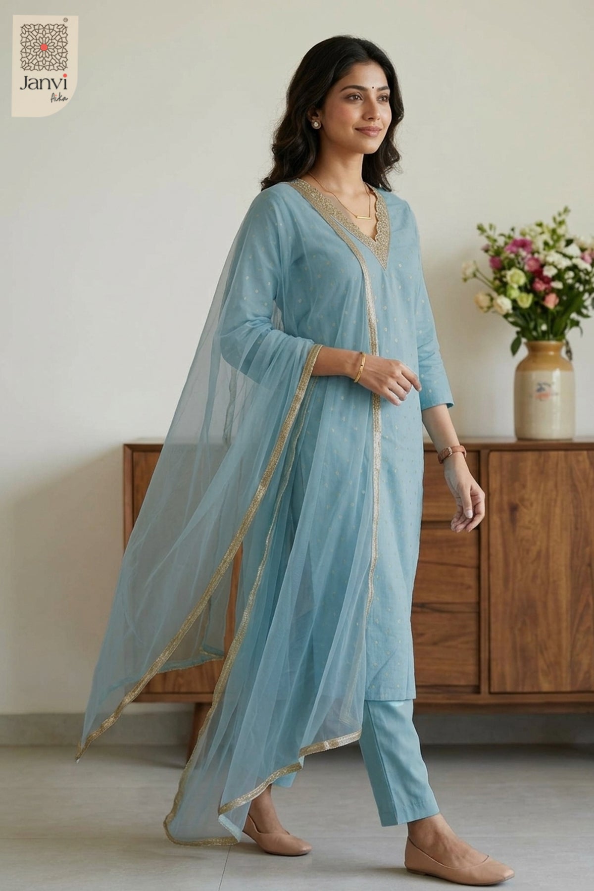Three quarter front standing angle showcasing a tailored churidar set readymade.