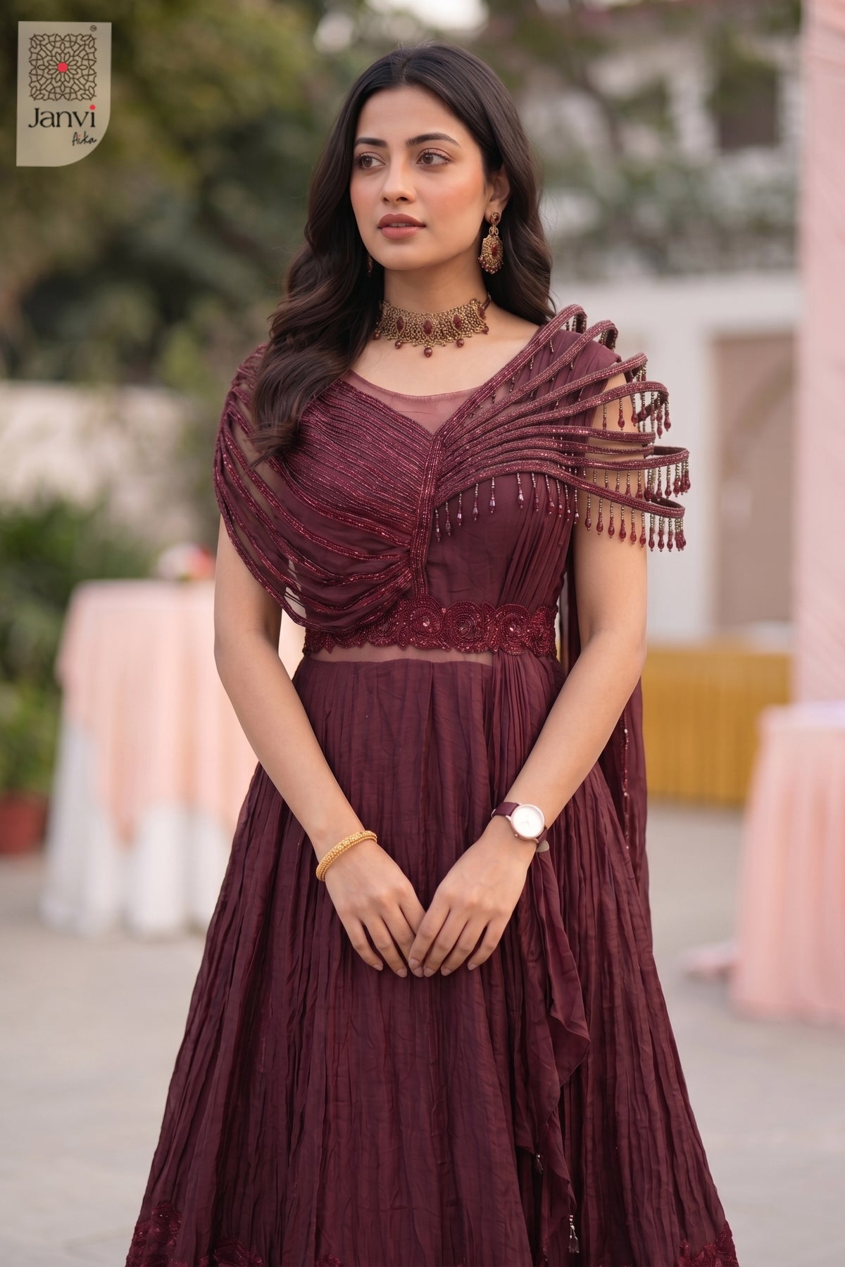 Appreciate this exquisite close up view outshining a basic maroon traditional dress for women.