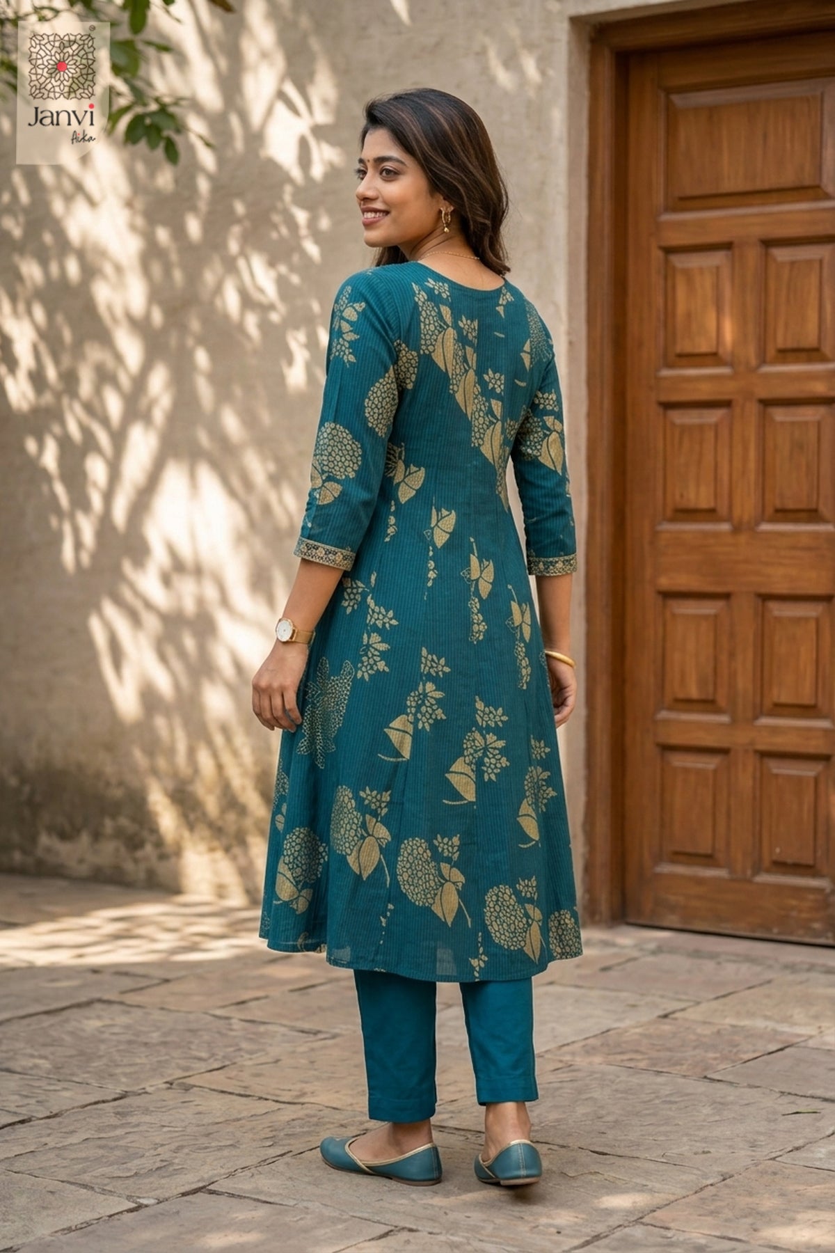 Front angled view of the flared silhouette of Gilded Azure for traditional navratri chaniya choli.