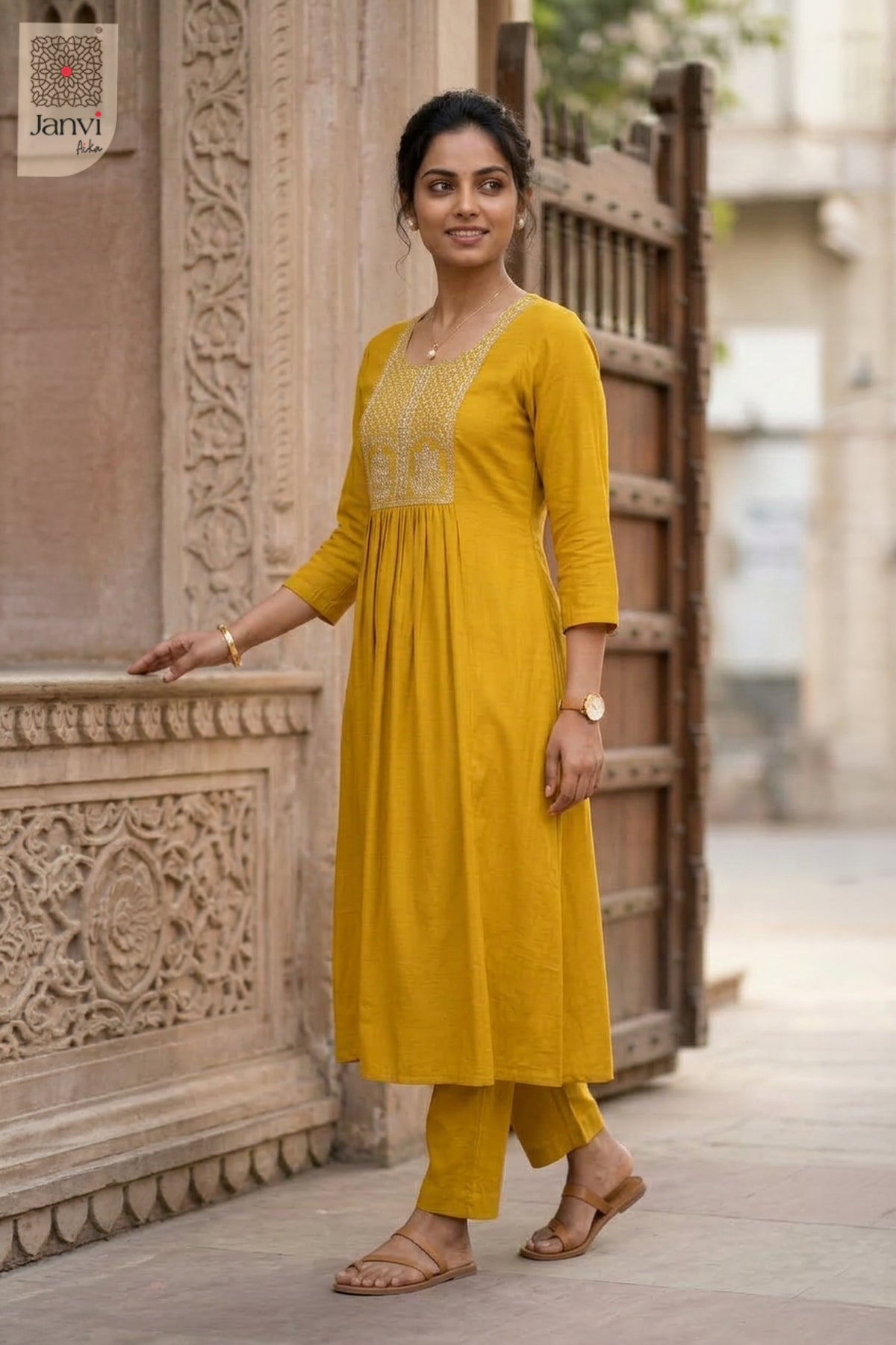 Side profile view of Golden Charm Top showcasing design for women's black dresses with sleeves.