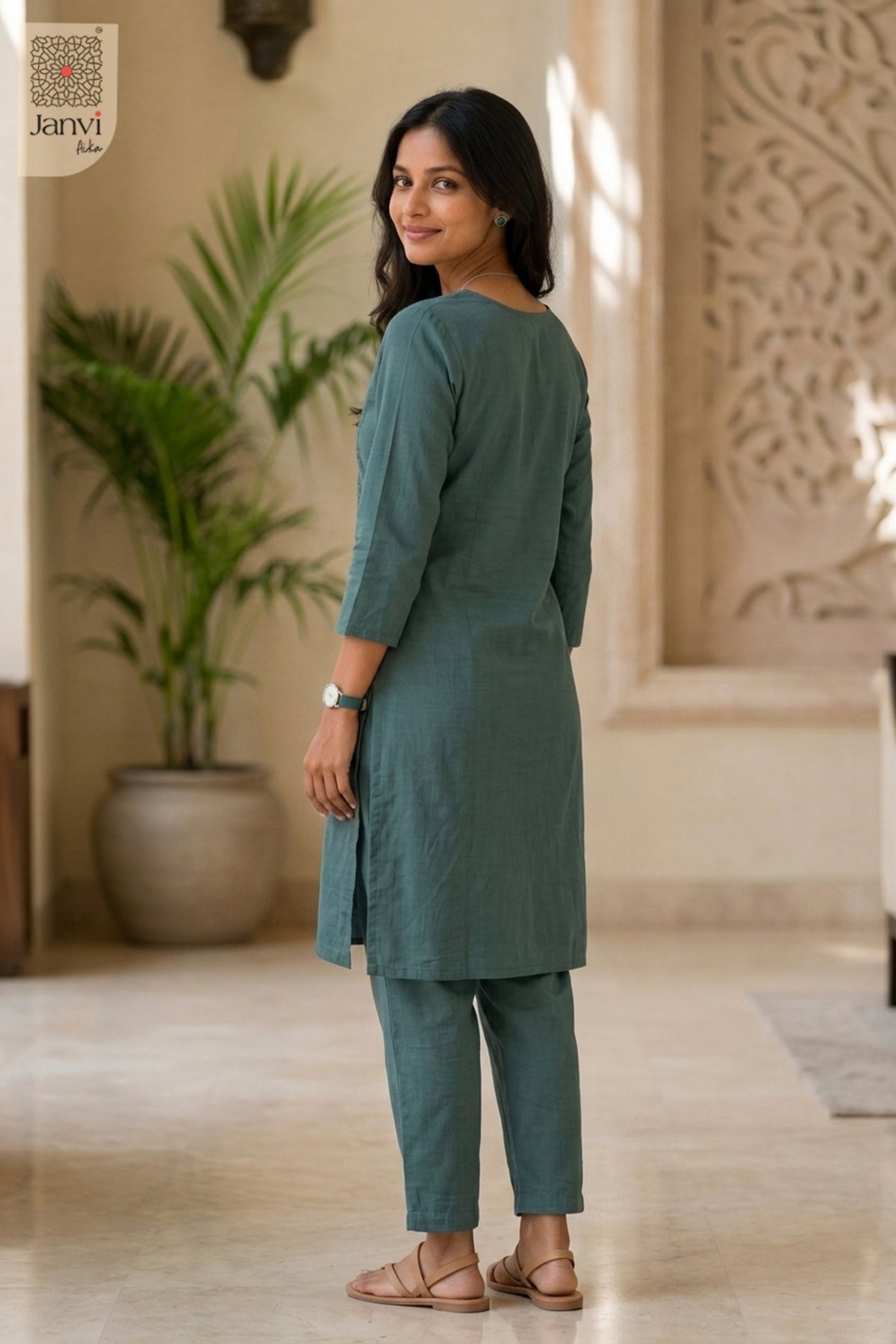 Back view of Greeny Vogue in light green mulmul cotton from the 2 piece outfits for ladies range.