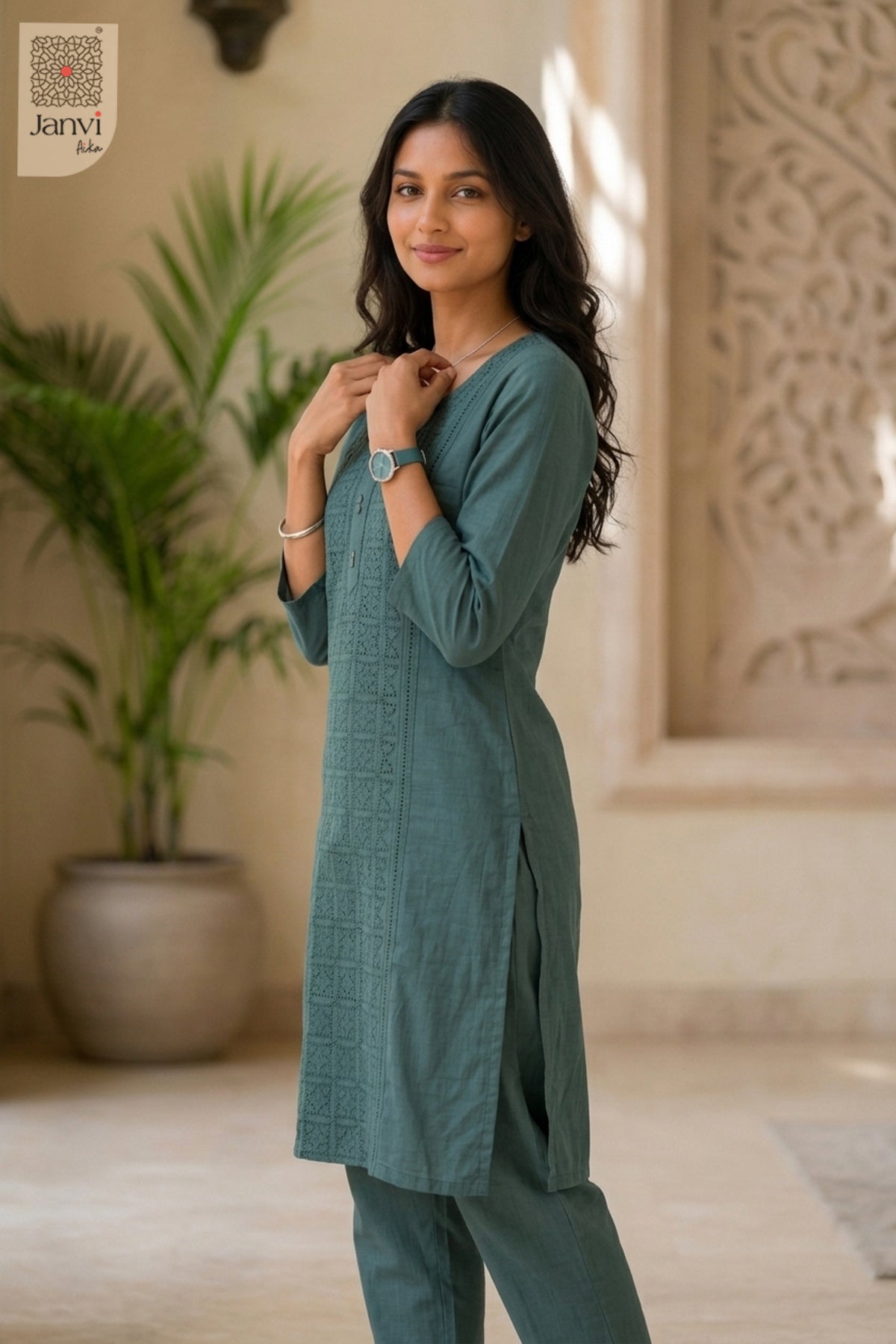 Three-quarter view of Greeny Vogue from the 2 piece outfits for ladies range with elbow sleeves.