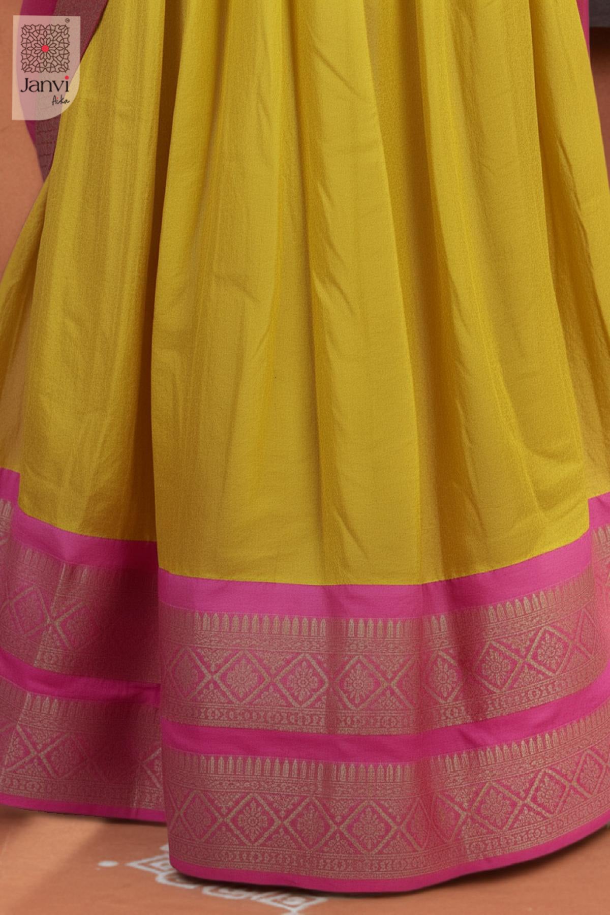 Skirt hem close up view of a half saree as a beautiful traditional lehenga saree.