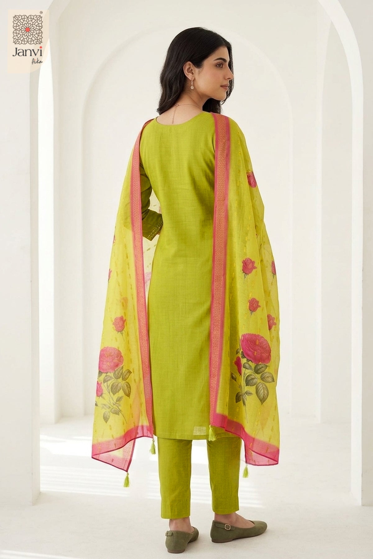 Studio rear view showing yellowish green printed drape on a churidar sleeves kurti.