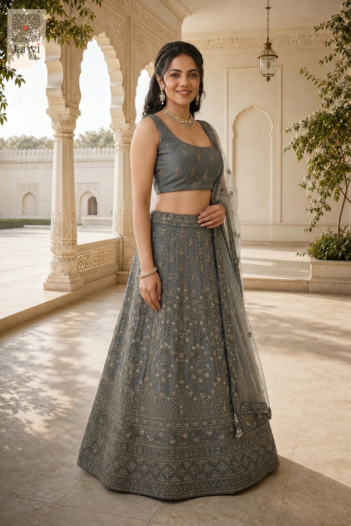 This front full standing shot showcases a gorgeous grey net purple pink lehenga for weddings.