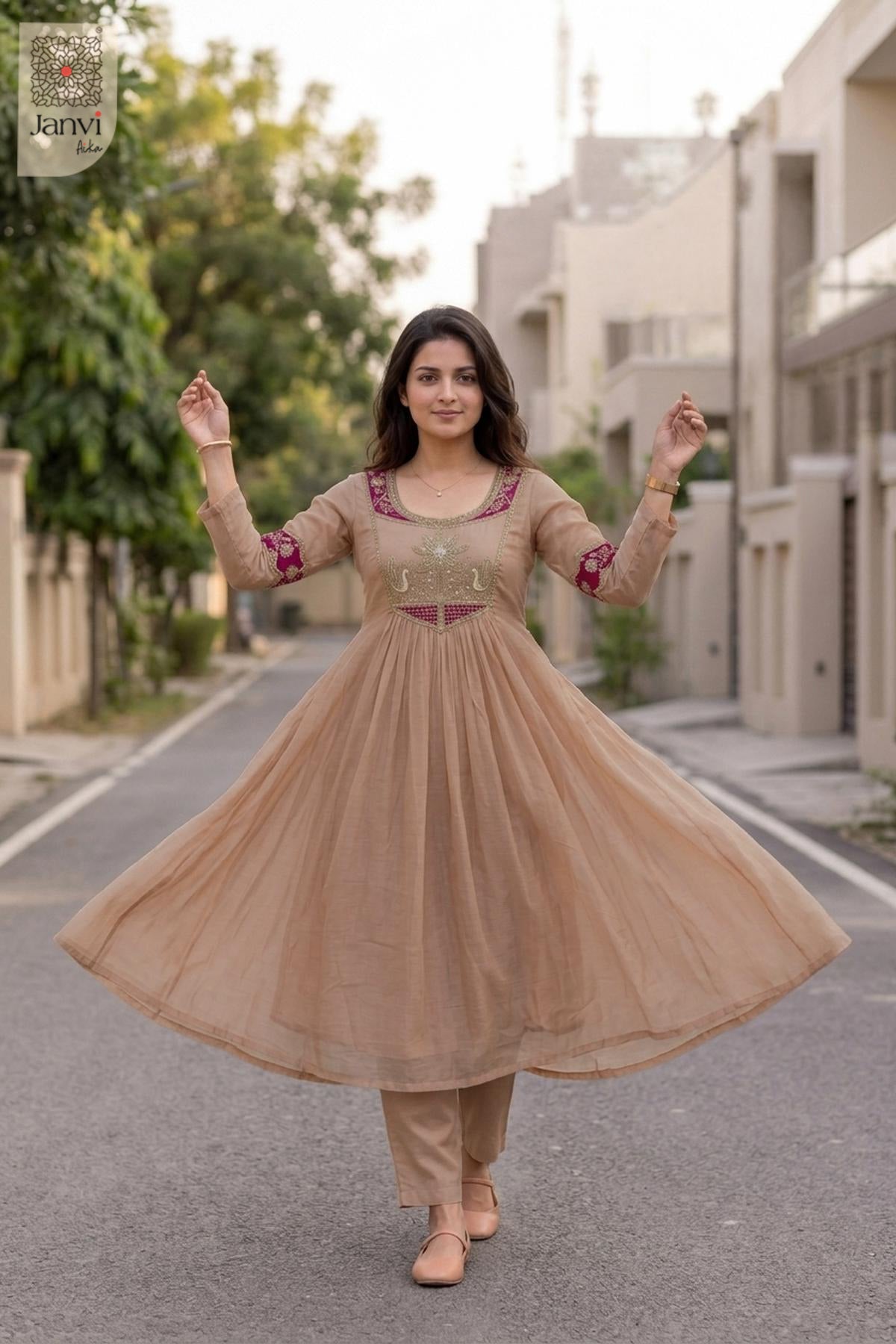 Full twirling flare motion showing the voluminous ghera of light peach anarkali lehengas.