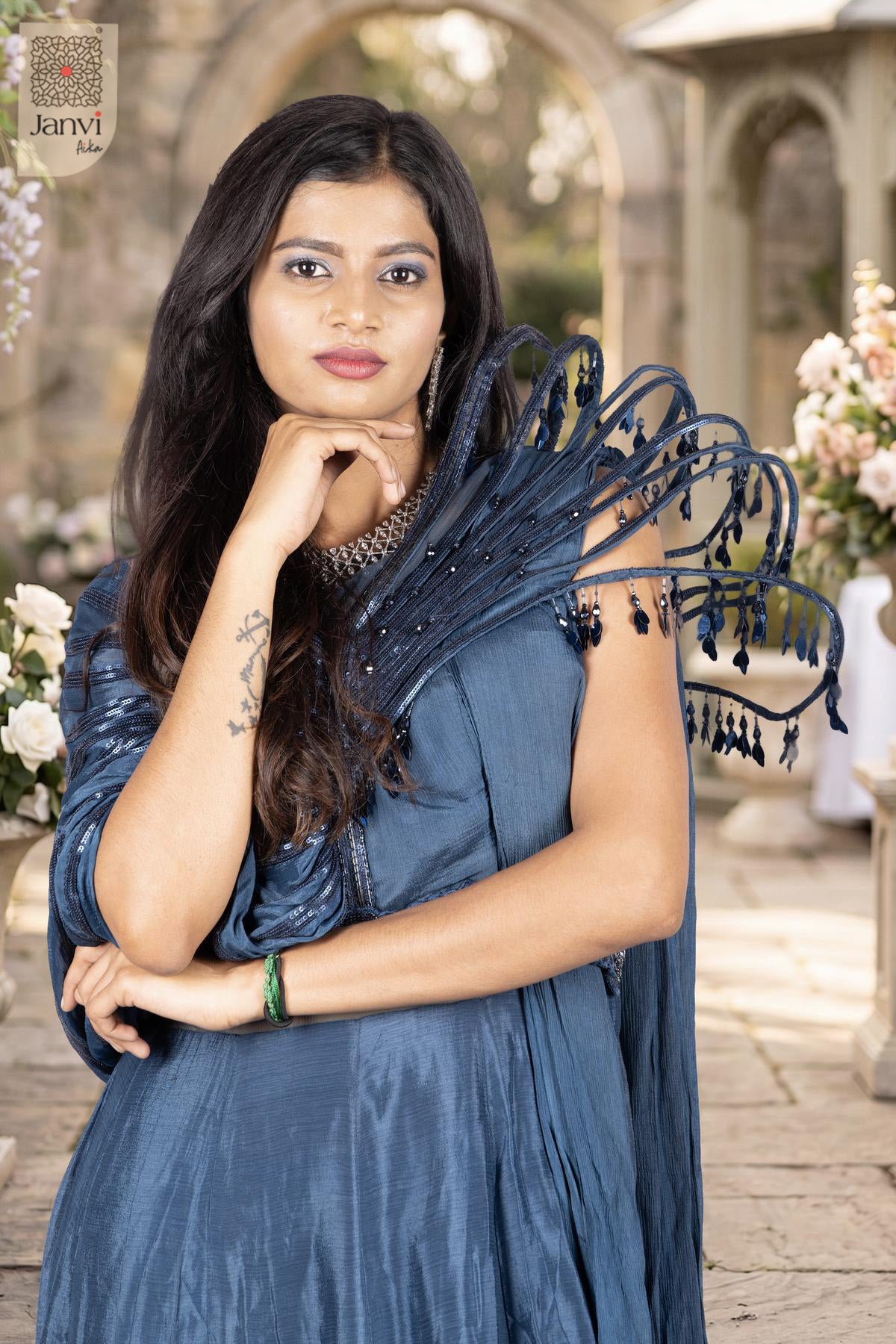 Admire the sheer beauty in this front close up view of a mesmerizing indian navy blue dress design.