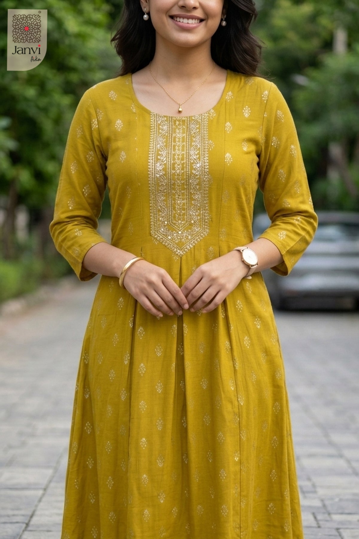 Close-up of bodice and embroidery of Mustard Bloom Top for plus size formal wear for women.