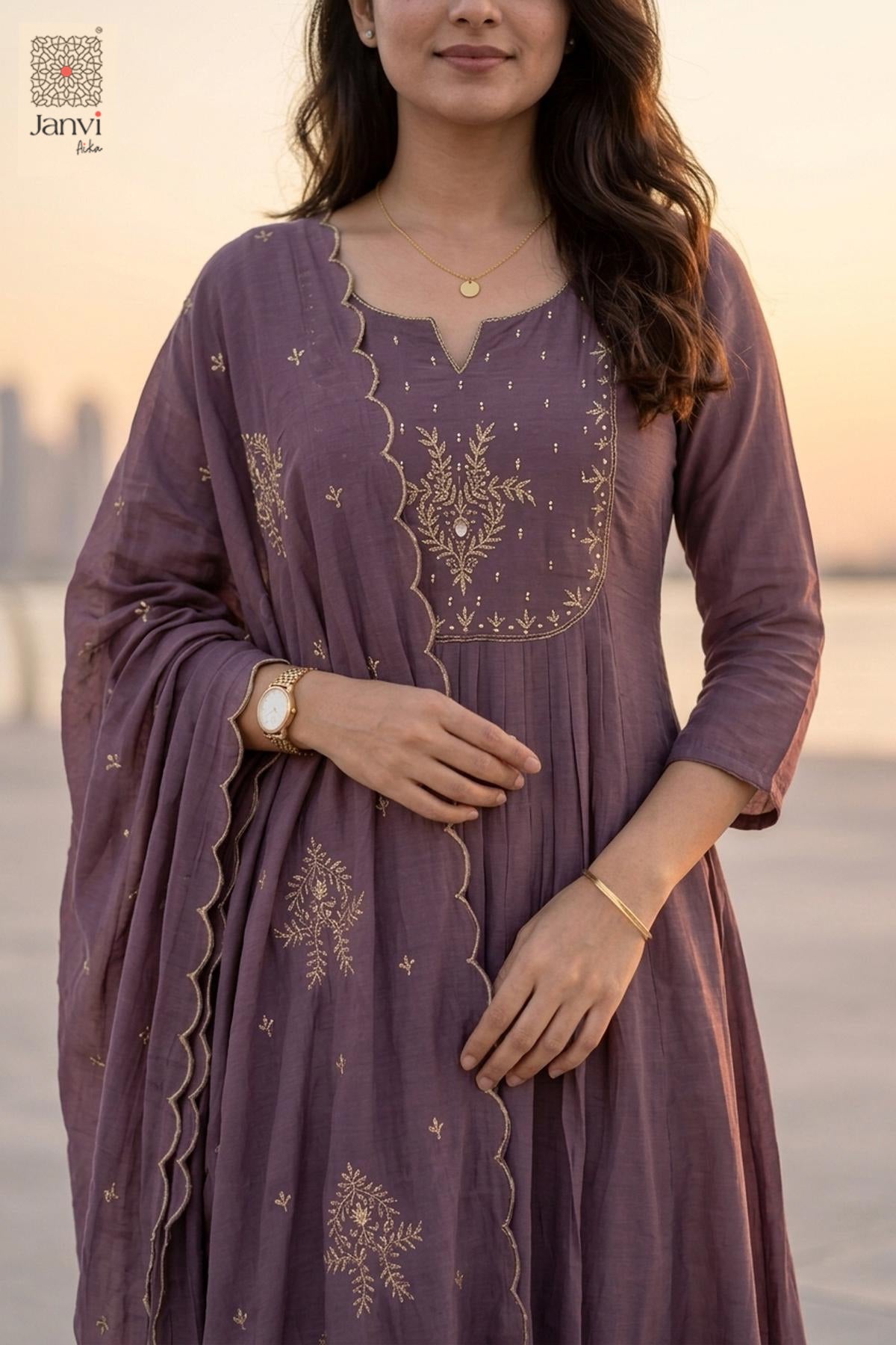 Close up portrait of gold yoke embroidery on a dark lavender short anarkali kurti.