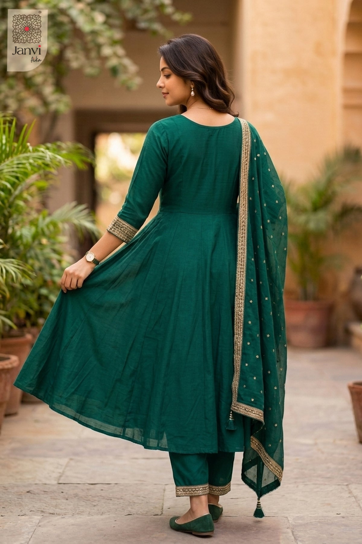 Front angled view of the flared silhouette of Naurya Teal for choli online shopping with price.