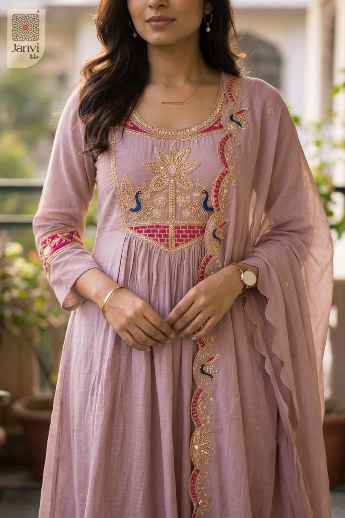Close up view of peacock floral yoke embroidery on a light lavender short anarkali kurti.
