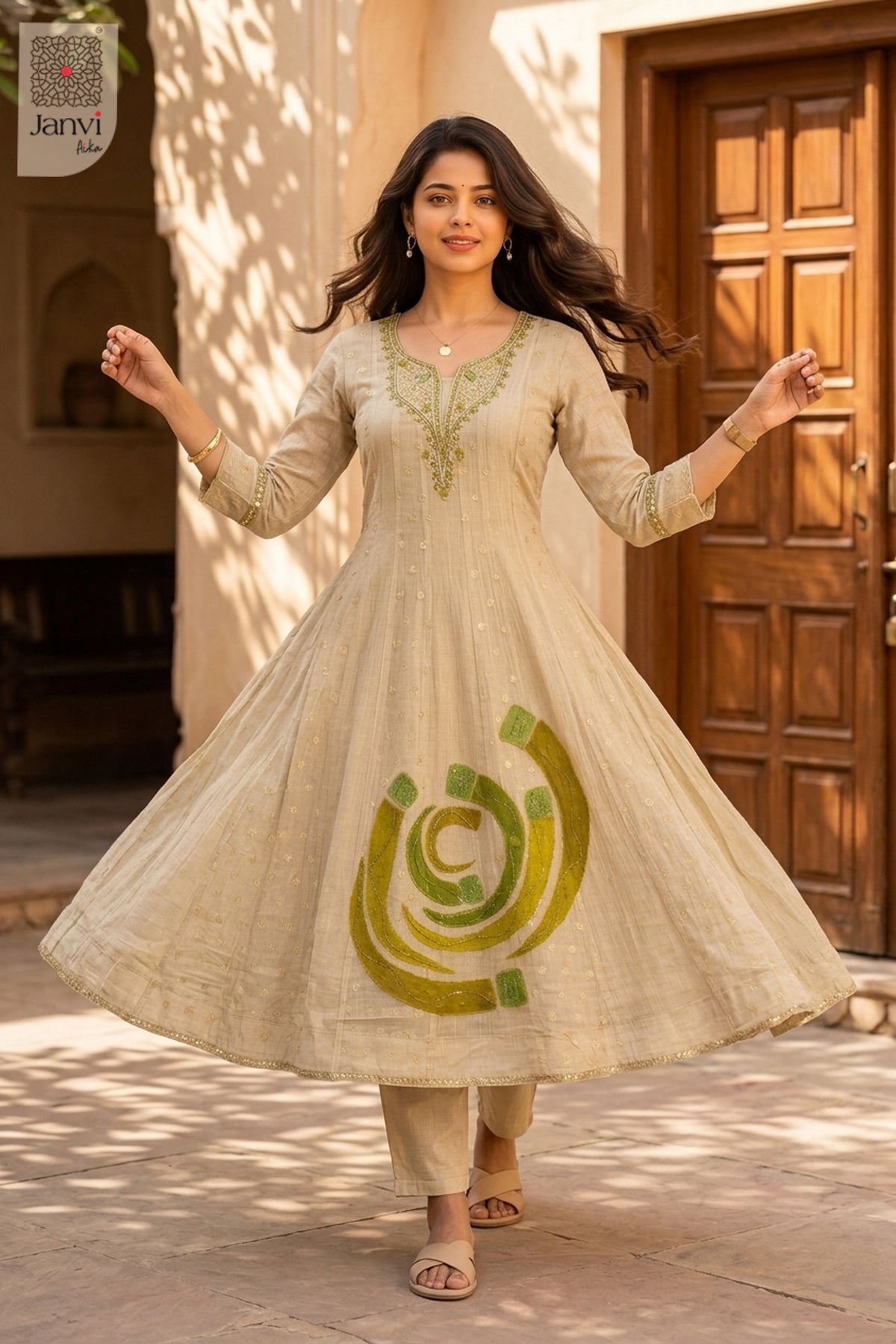 Front angled view of the flared silhouette of Pista Swirl for indian party wear dress for ladies.