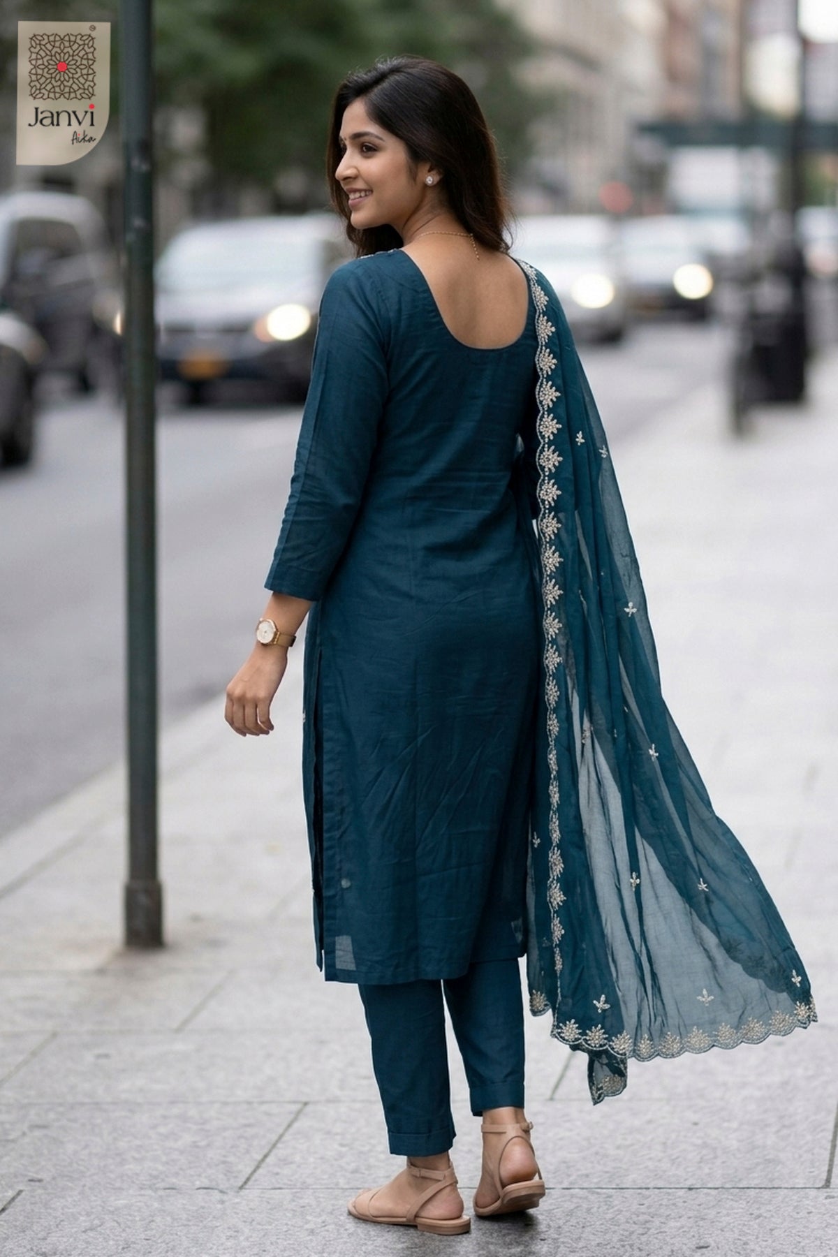 Waist-up front view of Teal Radiance presenting style for formal western dresses for ladies.