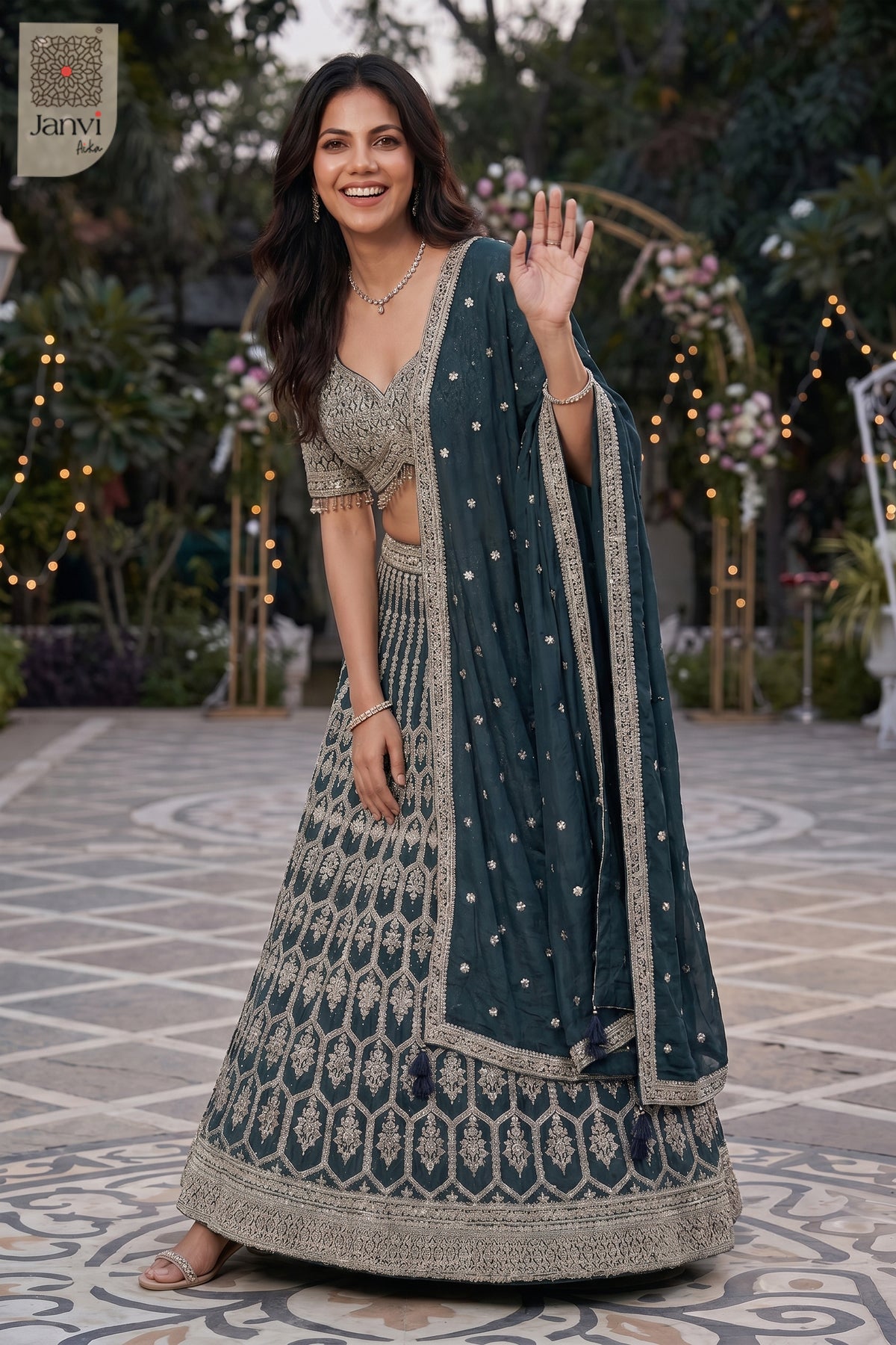 Charming latest lehenga showing a lovely front full standing shot in a bottle green georgette style.