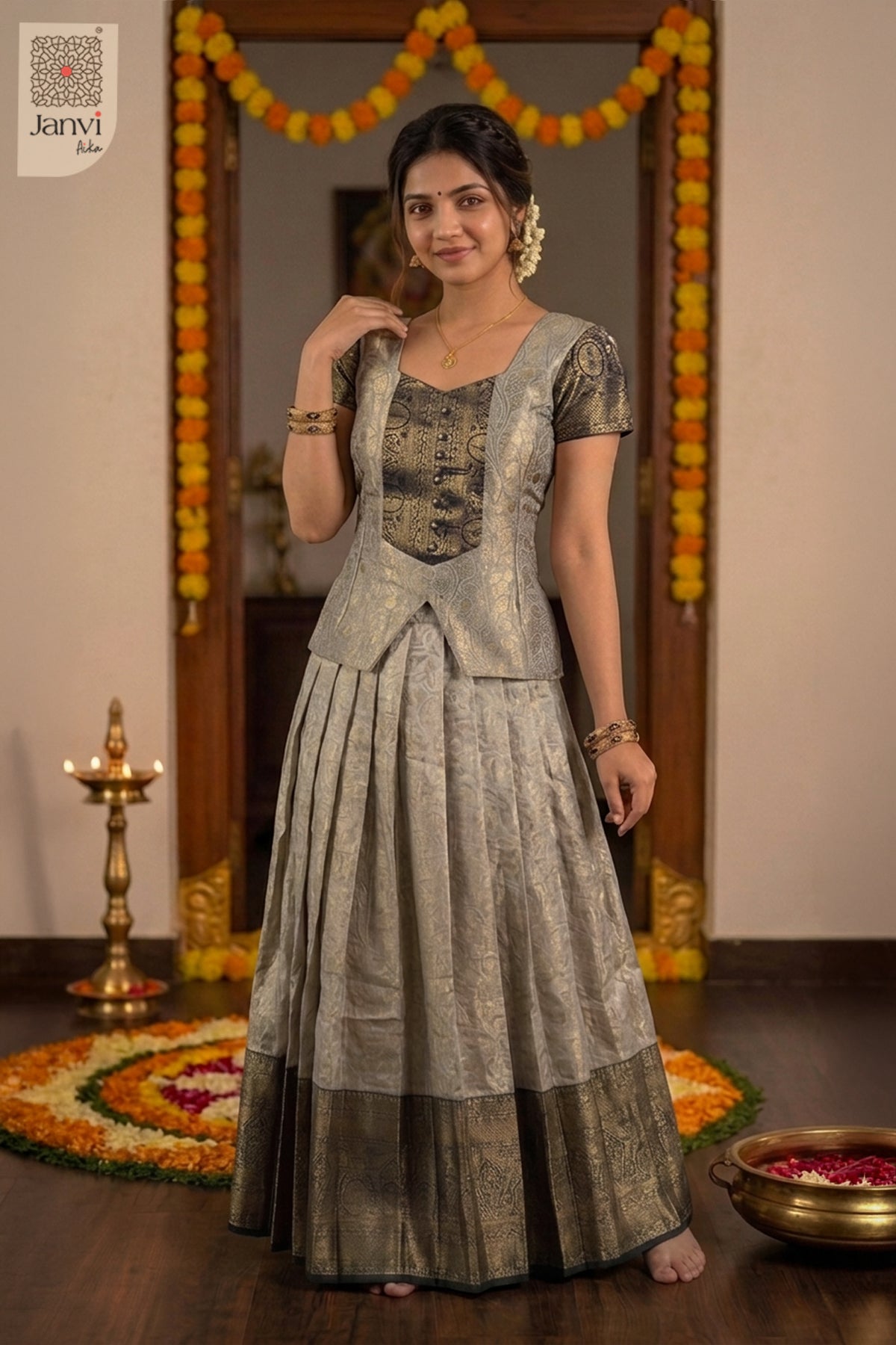 Front view of champagne silver coat and lehenga with scalloped green border.