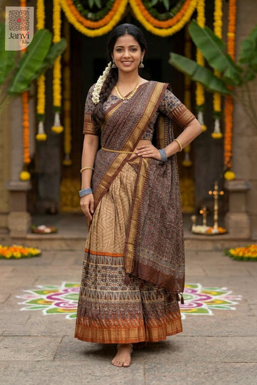 Front full standing shot of a half saree as a beautiful silk saree lehenga style.