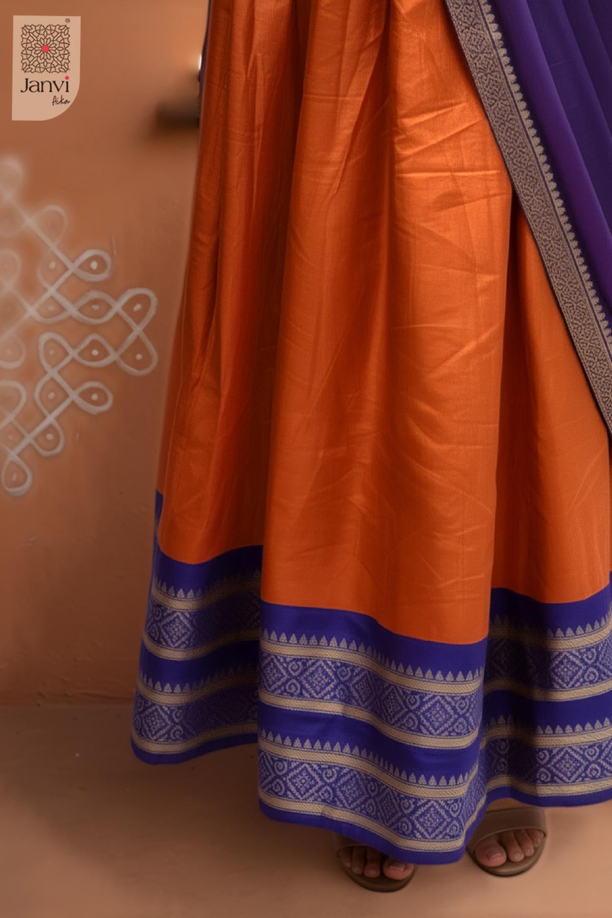 Skirt hem close up view of a half saree as a beautiful lehenga saree for ladies.