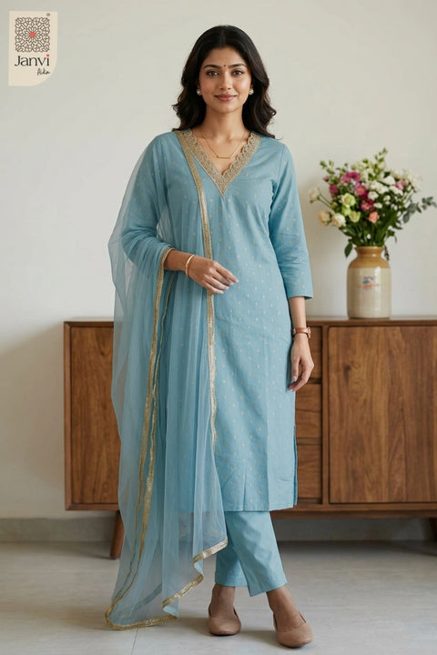Graceful indoor standing portrait in an elegant festive floral party wear churidar.