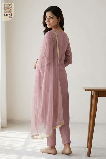 Rear back view showing delicate neckline and printed dupatta drape in a churidar dress.