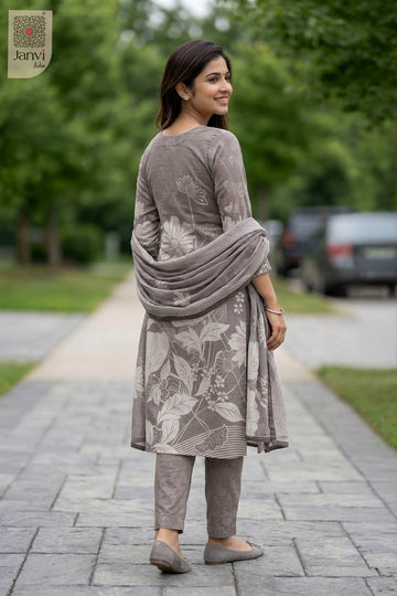 Front angled view of the flared silhouette of Blossom Taupe for formal western dresses for ladies.