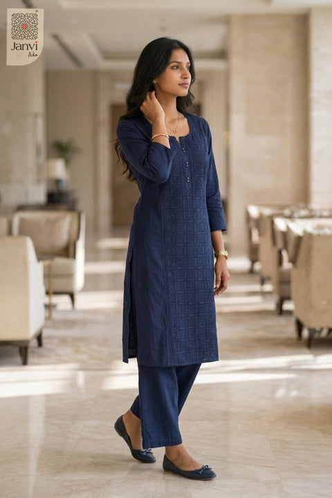 Walking view of Blue Majesty from the 2 piece outfits for ladies collection with straight pants.