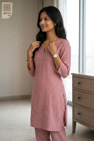 Three-quarter view of Blush Harmony from the 2 piece outfits for ladies range with elbow sleeves.