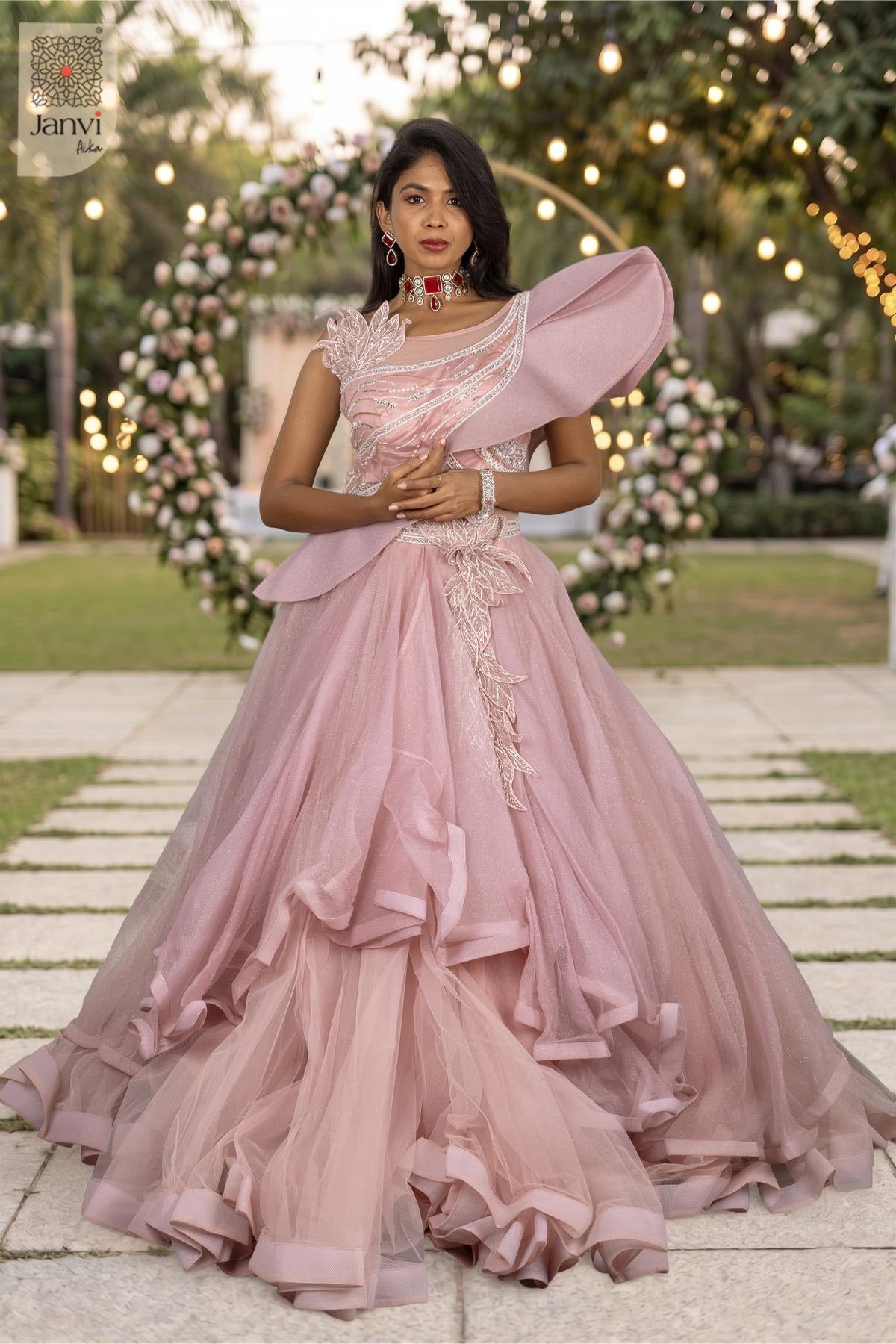 A magnificent front full view unveils elegant party clothes for women in soft pink tulle.