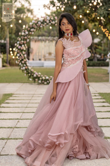Turn heads in this side profile of our breathtaking bridal reception dress featuring ruffles.