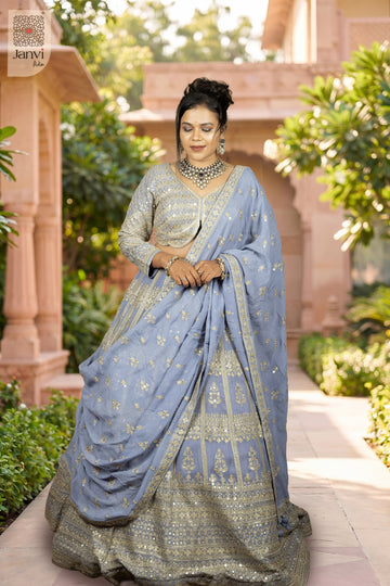 This front full standing shot showcases a gorgeous lavender georgette lavender bridal lehenga.