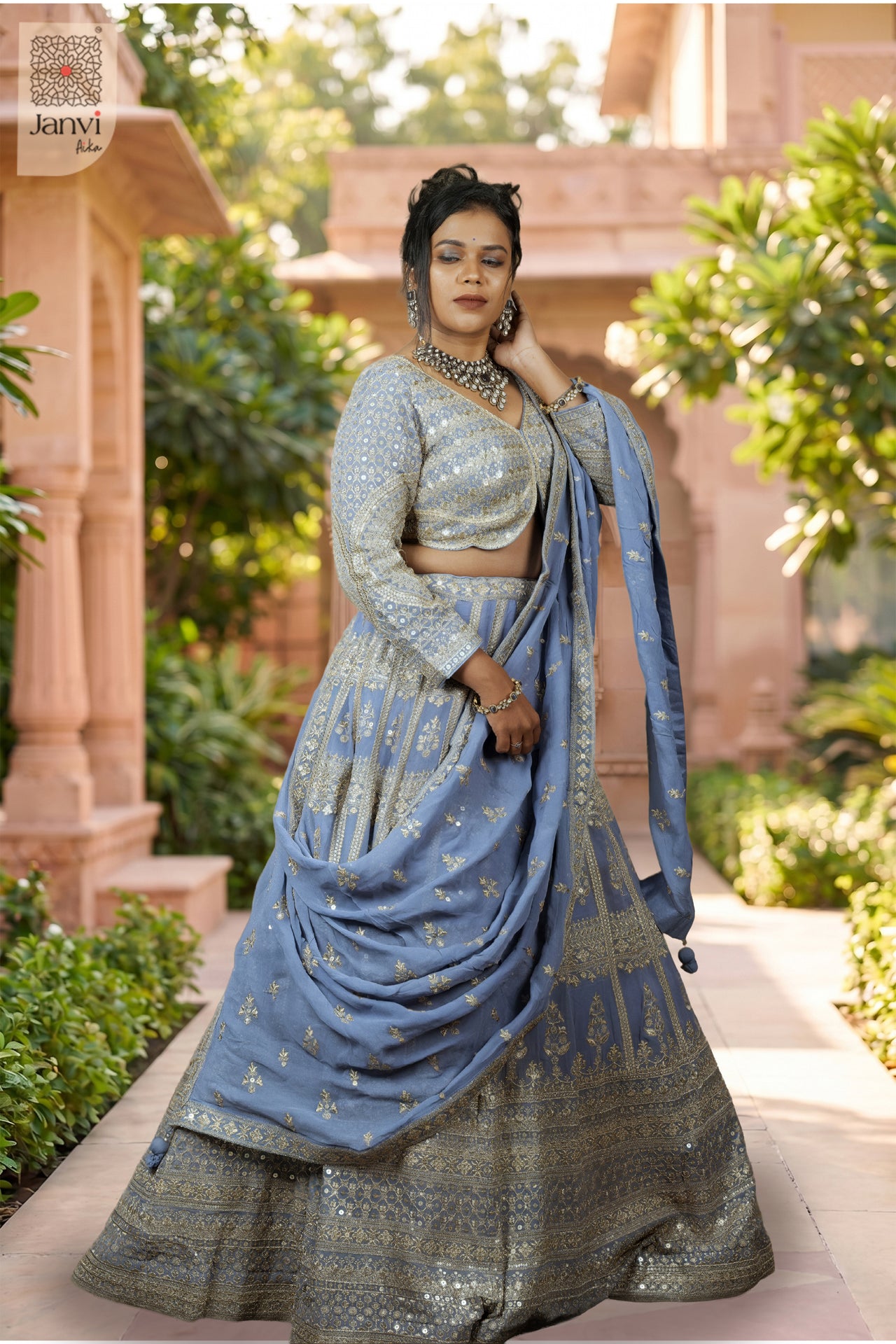 Stunning lavender georgette south indian pattu lehenga with an exquisite standing side profile shot.