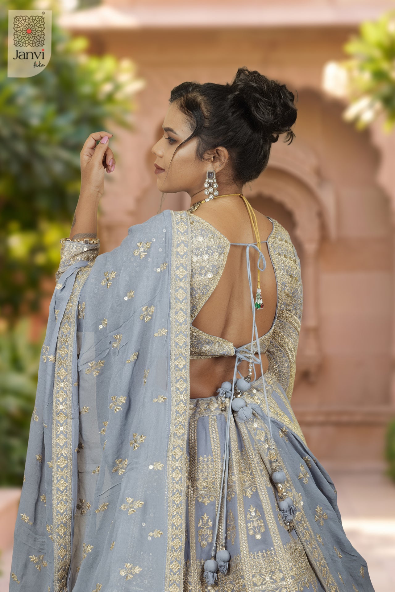 Waist up rear keyhole neck of a classic lavender georgette latest bridal lehenga designs design.