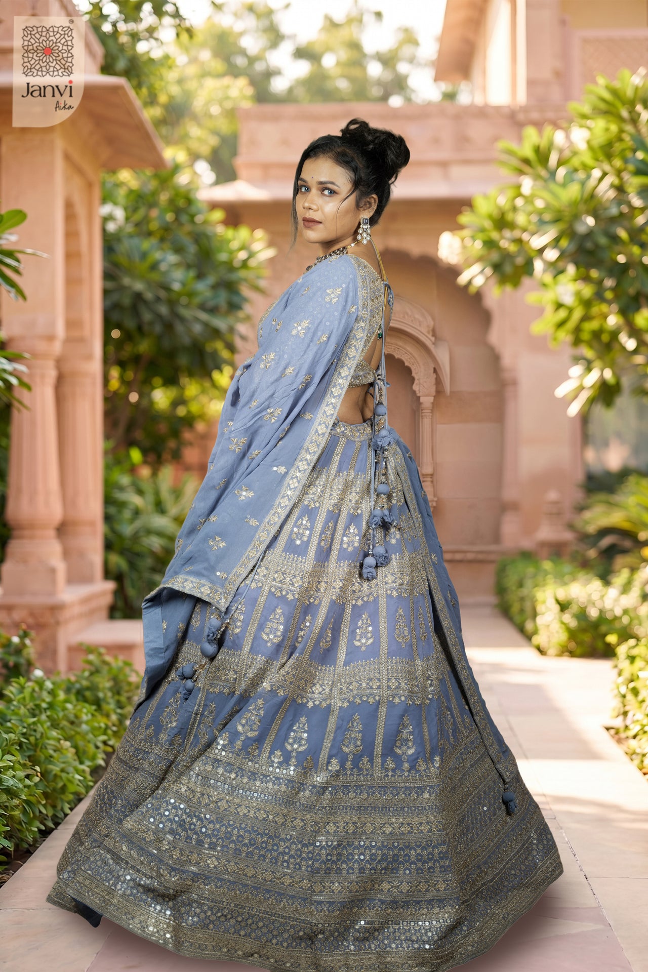 An exquisite shaadi ka lehenga with rear full standing shot in a premium lavender georgette design.