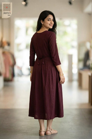 Back view of very dark red 3 4 sleeve tops for women featuring back tie cord details