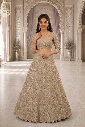 An exquisite long blouse lehenga with front full standing shot in a premium net design.