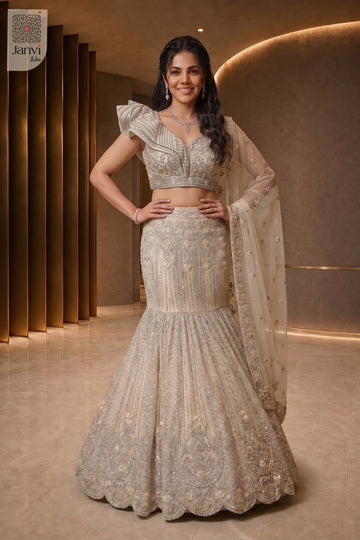 Elegant half white net bridal lehenga on sale featuring a detailed front full standing shot.