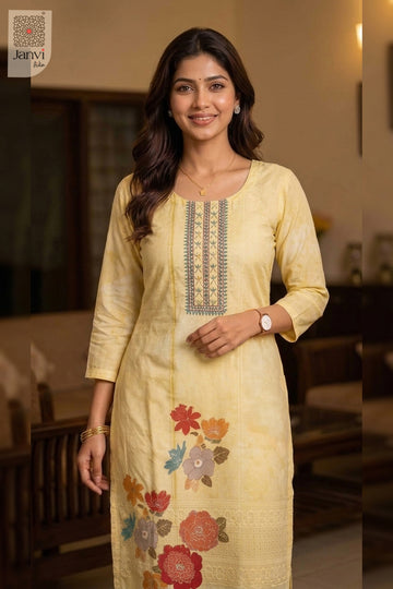 Front close up shot highlighting yoke on a pastel soft orange party wear churidar.