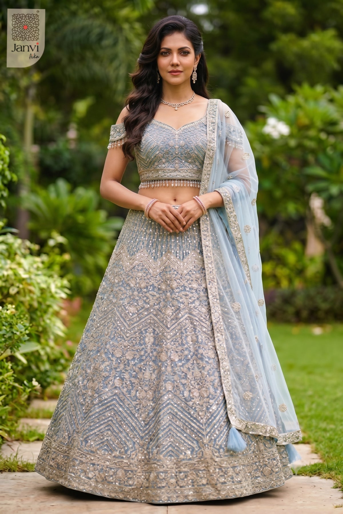 Front full standing shot of a classic ice blue net indian bridal lehenga design.