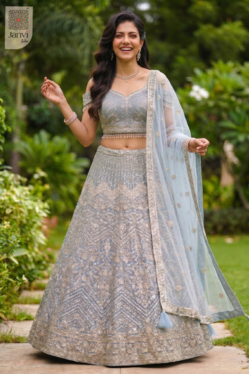 Elegant ice blue net readymade lehenga featuring a detailed front full standing shot.