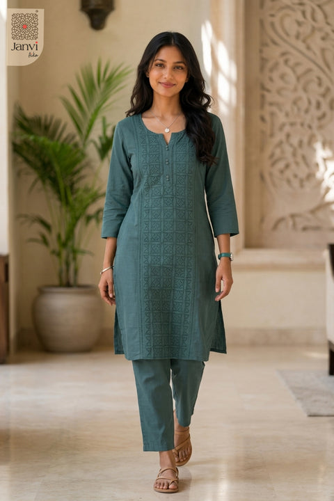 Standing front view of Greeny Vogue in light green from the 2 piece outfits for ladies collection.