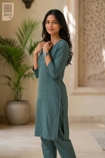 Three-quarter view of Greeny Vogue from the 2 piece outfits for ladies range with elbow sleeves.