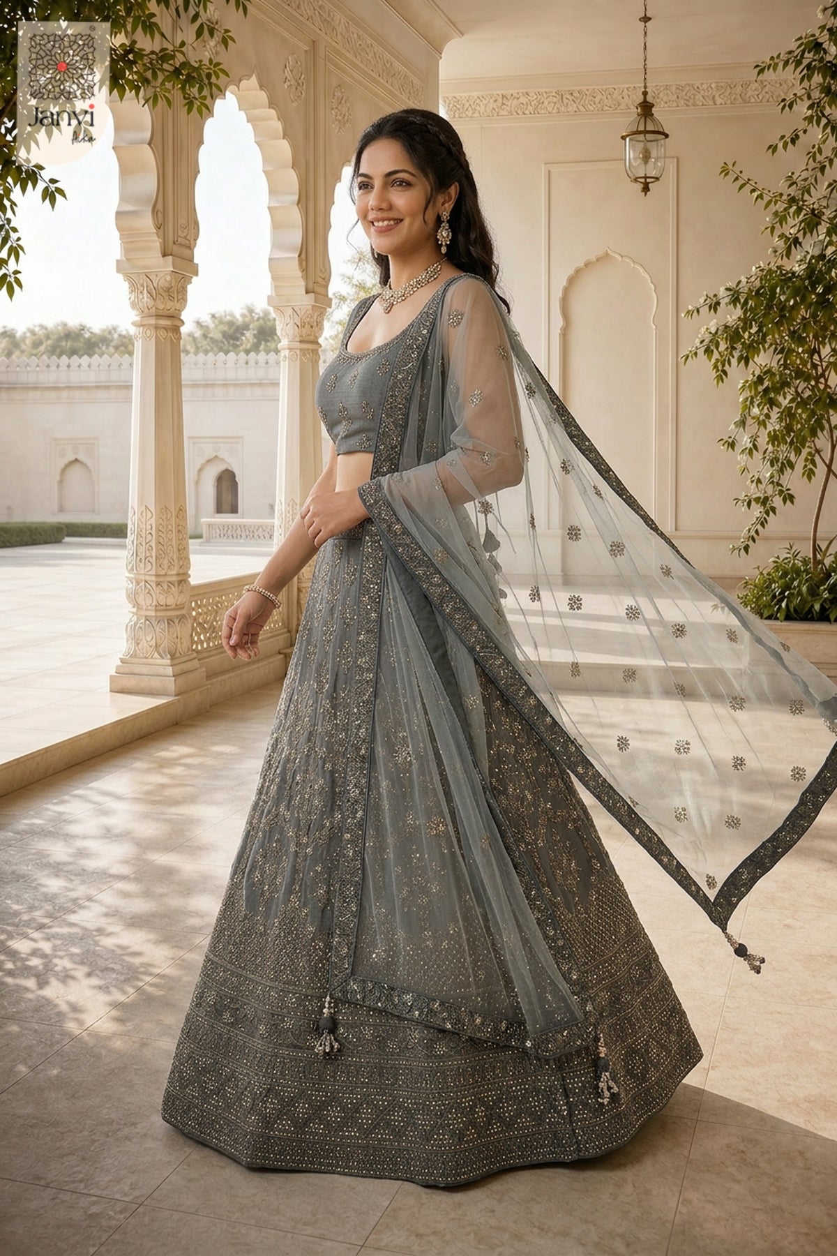 Standing side profile shot of a beautiful grey net floral lehenga designs for weddings.