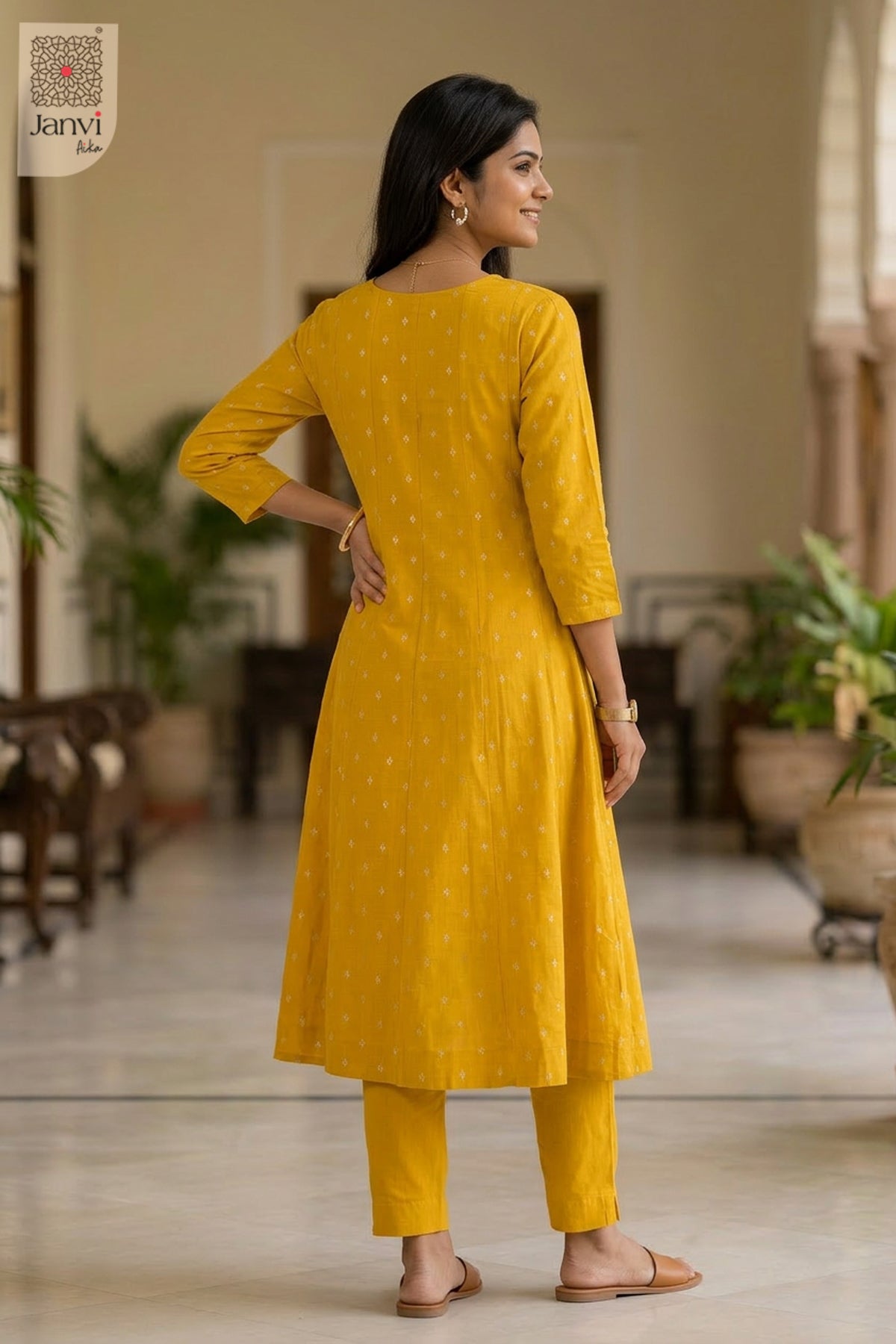 Front angled view of the flared silhouette of Honey Bloom for simple party wear dress for ladies.