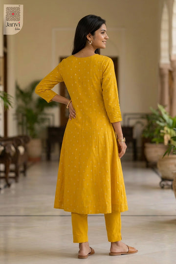 Front angled view of the flared silhouette of Honey Bloom for simple party wear dress for ladies.