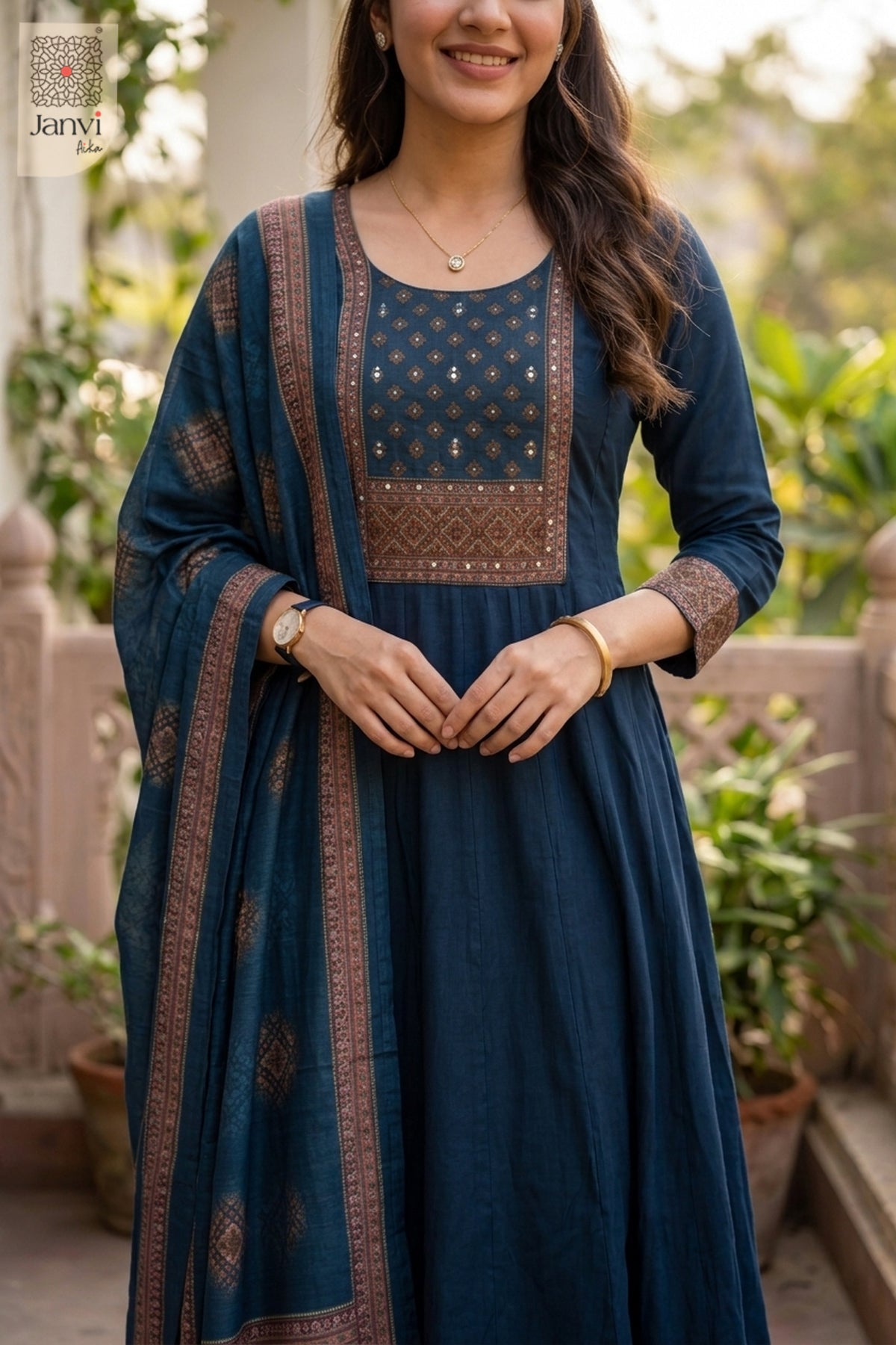 Front close up portrait of navy blue intricate yoke embroidery on an anarkali kurta.