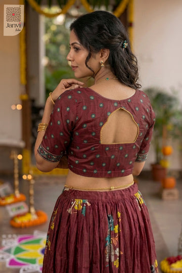 Waist up rear keyhole neck of a half saree as a beautiful saree come lehenga for weddings.