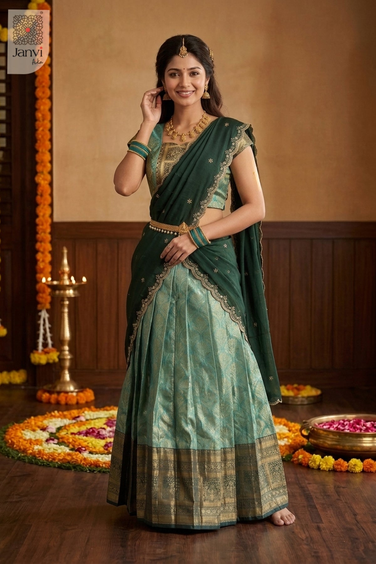 Model in jade green designer lehenga saree with scalloped embroidered dupatta.