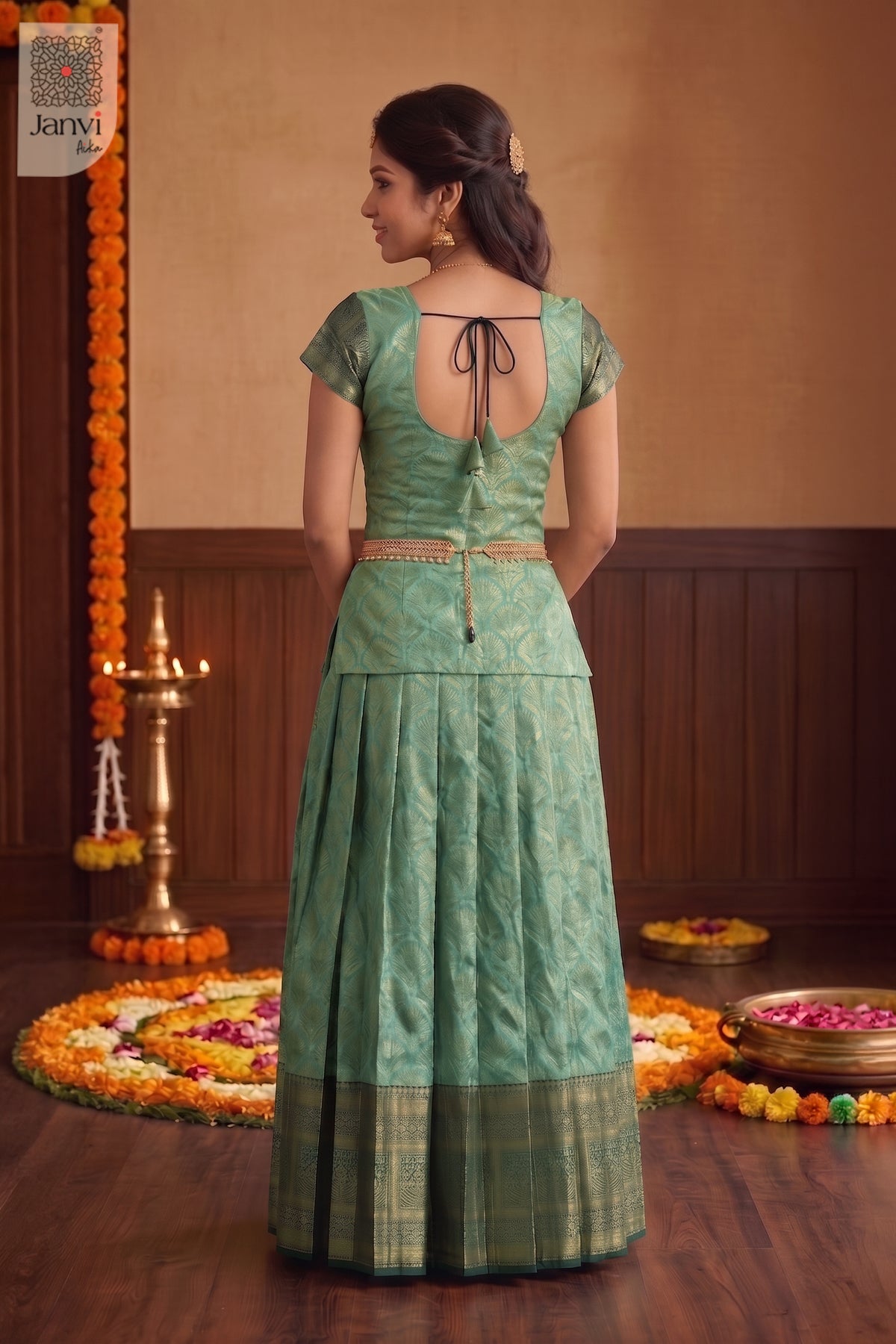 Back view showing jade silk brocade blouse and skirt from a silk lehenga saree set.