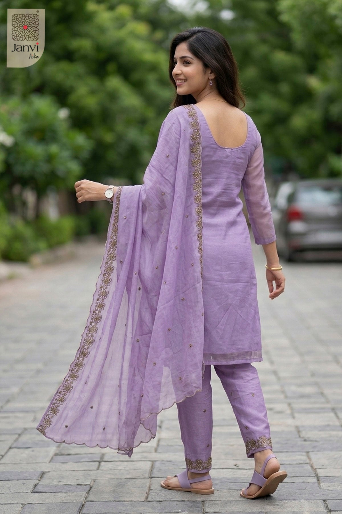 Front angled view of the flared silhouette of Lavender Silk for birthday party dresses for ladies.