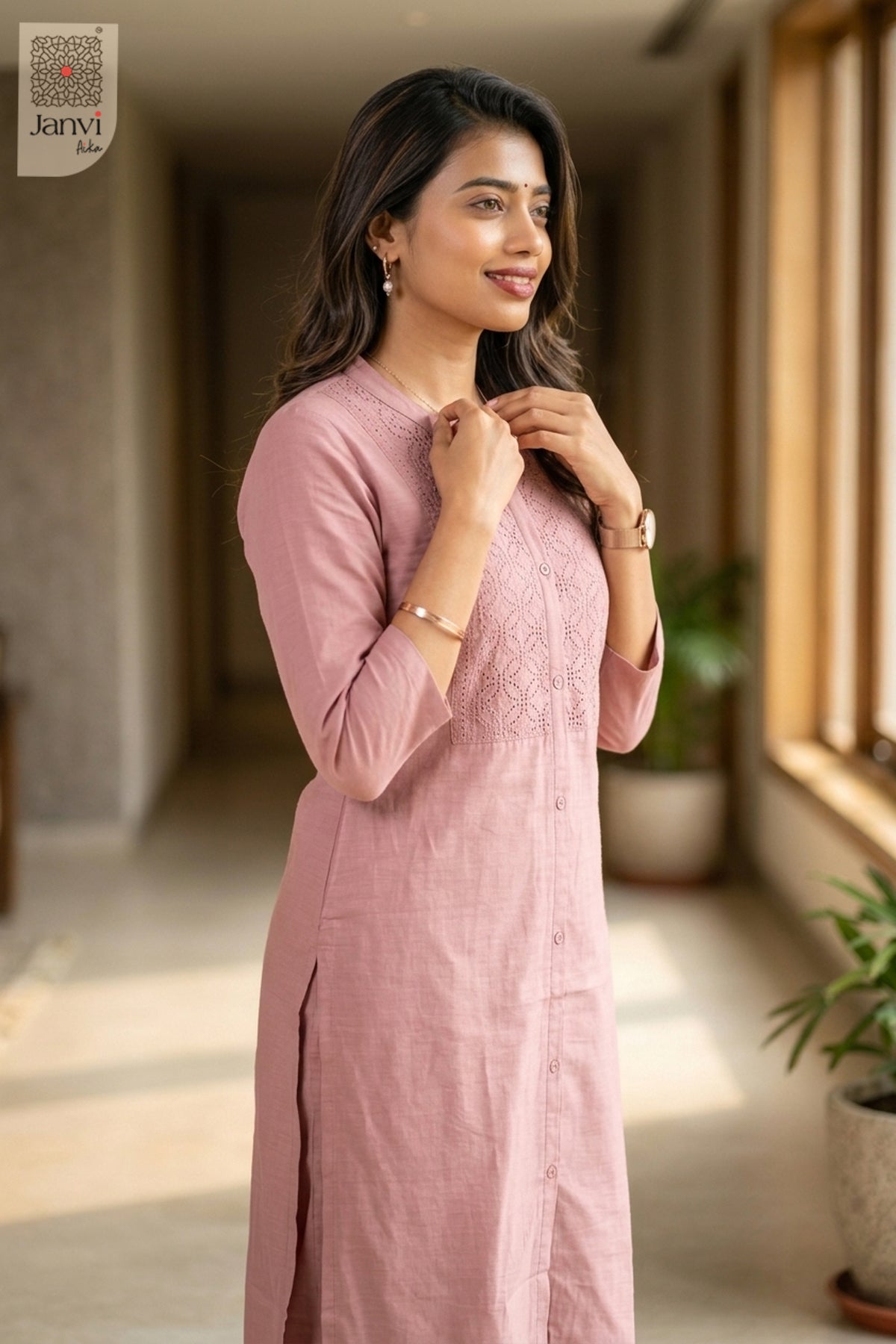 Three-quarter view of Luxey Soft Rose from the 2 piece outfits for ladies range with elbow sleeves.