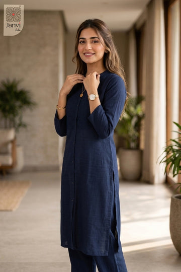 Three-quarter view of Midnight Muse from the 2 piece outfits for ladies range with elbow sleeves.